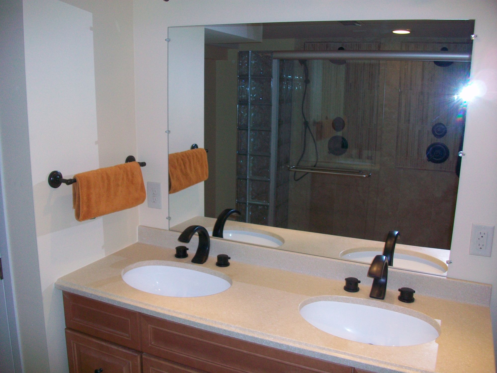 Image of his and hers sinks in a bathroom remodel