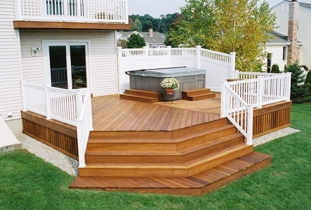 Image of a remodeled deck with hot tub in a minnesota backyard